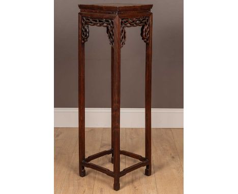 A Chinese hardwood jardinière stand with pierced carved decoration below the top33cm wide x 33.5cm deep x 111.5cm highQty: 1A