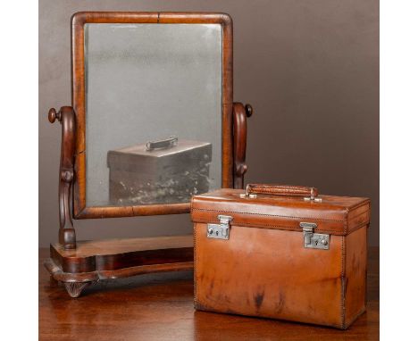 A Harrods Ltd leather case with carrying handle to the top; together with a 19th century mahogany dressing table mirrorthe Ha