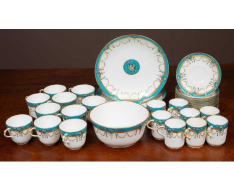 A Minton part tea service with gilt and sèvres blue decoration comprising ten teacups; eight coffee cups; ten saucers; a bowl