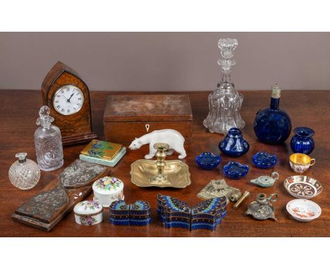 A collection of ornaments to include glass decanters, a Royal Copenhagen porcelain polar bear, a wooden box, brassware, furth
