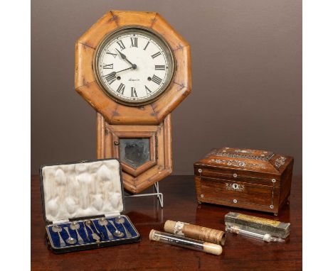 Five items including A drop dial clock by Ansonia with Roman numerals on the paper dial, a rosewood sarcophagus-shaped tea ca