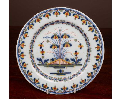 An 18th Century delftware plate,23.2cm diameter