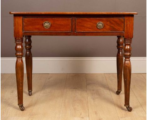 An 18th century mahogany side table, the rectangular top above two fitted drawers with brass pull handles, raised on turned l