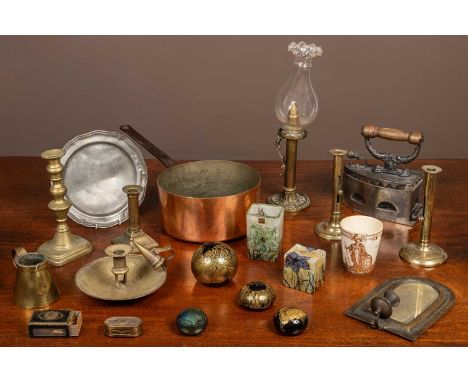 A collection of metalware to include a candle lamp with associated glass shade; an old iron; a copper saucepan; various Isle 