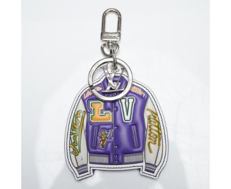 A men's varsity jacket keychain and bag charm featuring a playful basketball design crafted in coated canvas and metal hardwa