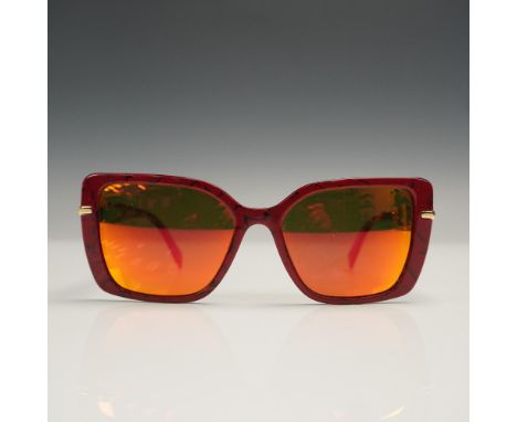 Bold Prada Milano sunglasses featuring a striking red marbled acetate frame with gold tone Prada logo plaques on each arm. Th
