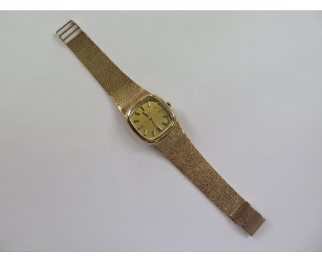 A gents Asprey 9ct yellow gold manual wind bracelet wristwatch, 33mm wide including button, 20cm long, No 22097 - total weigh