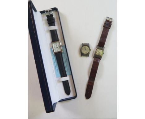 A silver gents manual wind dress watch, 22mm wide running and a silver services watch head - not working  - and a sterling si