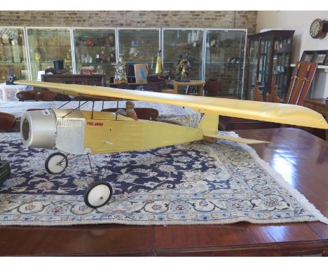 A balsa wood framed model aeroplane, The Duke, with pilot but no engine - wing span 165cm - 127cm long 