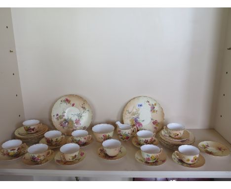 A Royal Worcester blush ivory floral decorated tea service - 37 pieces in total including one spare saucer - all generally go