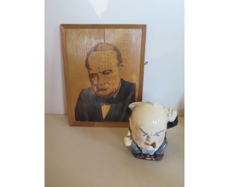 A Burliegh ware Winston Churchill character mug 13.5cm high, together with a wooden inlay portrait of Churchill 26.5cm x 20cm