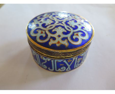 An Islamic enamel lidded pot - 8cm x 4cm - clean condition 