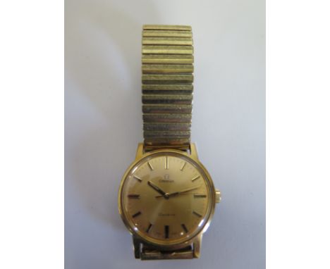 A Gentlemen's automatic Omega Geneve wristwatch, with gold plated case and bracelet, featuring an engraved dedication to the 