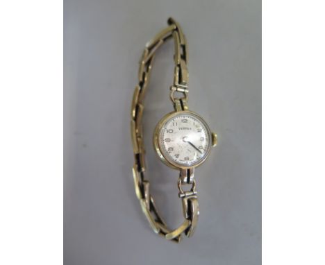 A ladies manual wind 9ct watch with sprung bracelet, total weight approx 12.8 grams, running in saleroom, generally good, som