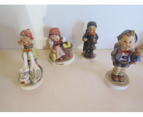 Four Hummel figurines, for details please see images, tallest 12cm high 