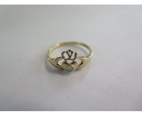 A 14ct Claddagh gold opal ring - size P/Q approx 1.8 grams - good condition 