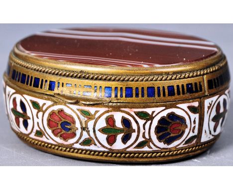 A 19th Century French Palais Royale manner pill box / snuff pot having a banded agate lid and base with gilt brass body set w