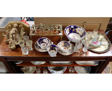 A gilt gesso cherub wall bracket, 23cm wide; three wedge-shaped cheese dishes; a silver-plated salver; & sundry other items.