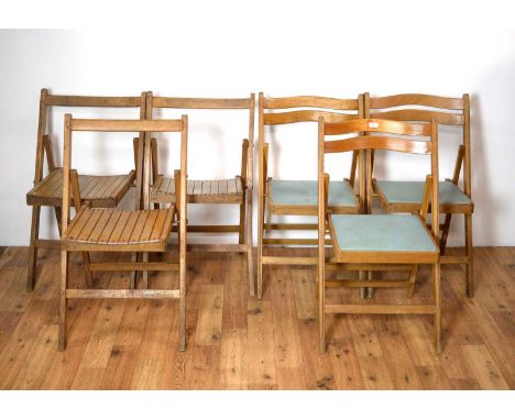 A collection of 23 vintage wooden chairs, all with pierced backrest and panelled seats, chairs fold away for ease of storage,