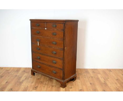 A 19th Century mahogany cupboard faced as a chest of drawers, the rectangular top with moulded edge over a single hinged door