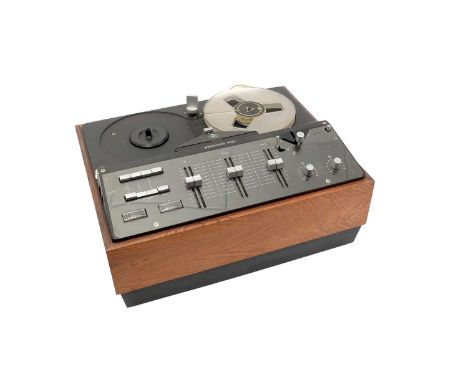 A Bang &amp; Olufson Beocord 1800 reel-to-reel tape recorder, on walnut plinth with Perspex dust-cover.