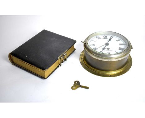 A Smiths Cricklewood railway clock, the silver plated brass case 23.5cms diameter; together with a Victorian family portrait 