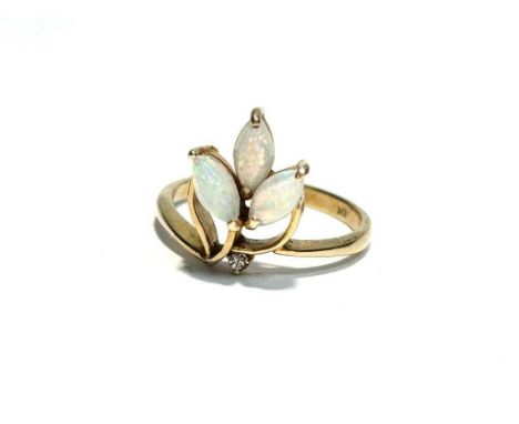 An opal and diamond dress ring, the three marquis-shaped opal cabochons set above a brilliant cut diamond on 10ct yellow gold