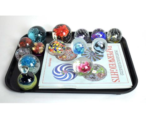 A collection of Caithness glass paperweights, including: ‘Vortex’ limited edition 195/1000; ‘Reflections Magenta’; ‘Reflectio