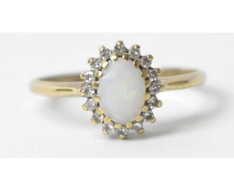 An opal and diamond cluster ring, on 9ct gold shank, ring size P, 1.8g gross.