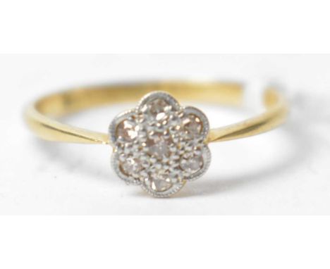 A diamond cluster ring, the 8-cut diamonds in illusion setting on 18ct yellow gold shank, ring size N, 1.6g gross.
