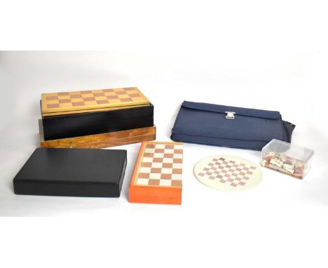 A collection of vintage board games, including: Mah Jong set, in case; a games compendium; and various chess sets, most cased