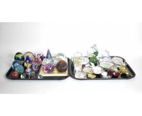 A collection of glass and other paperweights, including: Okra ‘The Stone of Peace’ paperweight; Mats Jonasson owl paperweight