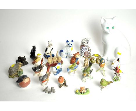 A collection of decorative animal figures, including: a Royal Crown Derby ‘Cottage Garden Kitten’ paperweight; a seated cat f