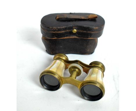 A pair of mother-of-pearl opera glasses, with case; and another pair; together with a collection of vintage spectacles, some 