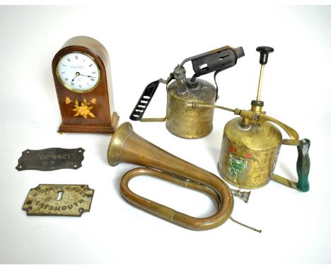 An Edwardian style inlaid walnut mantel clock, by Knight-Gibbins, London; a copper bugle; a Governor Paraffin blow torch; ano