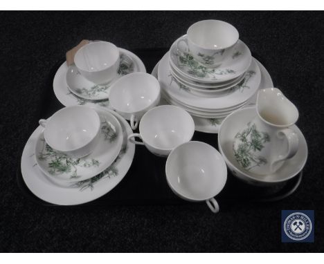 A tray of twenty-one piece antique Royal Doulton tea service decorated with flowers 