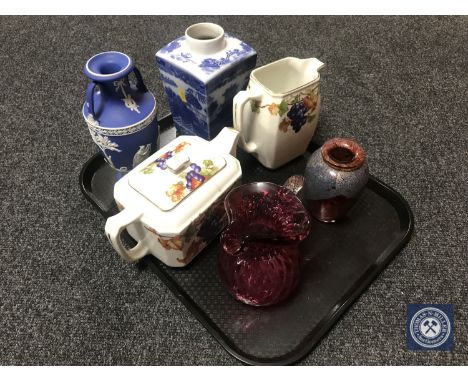 A tray of Ringtons Maling teapot and water jug, Ringtons caddy, Wedgwood twin-handled Jasperware vase together with a cranber