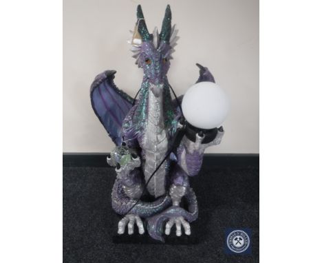 A large contemporary figural table lamp in the form of a dragon