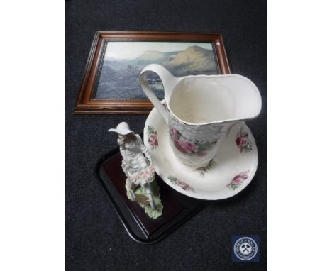 A floral pottery wash jug and basin together with a contemporary Italian figure of a lady on bike and mahogany framed landsca