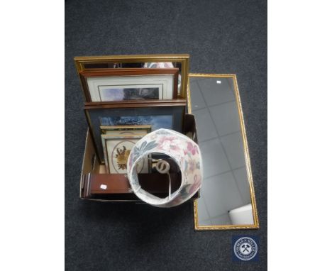 A box of framed prints, framed mirrors, Westminster wall clock, table lamp and shade