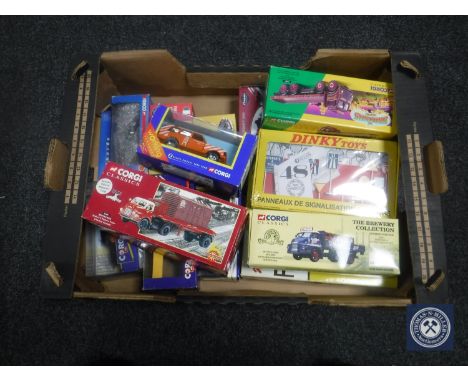 A box of die cast vehicles including Corgi classics delivery vans, Corgi Showmans flat bed truck, Dinky etc.