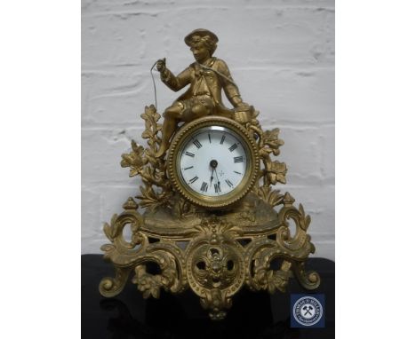 A nineteenth century continental gilt metal mounted mantel clock with enamel dial 