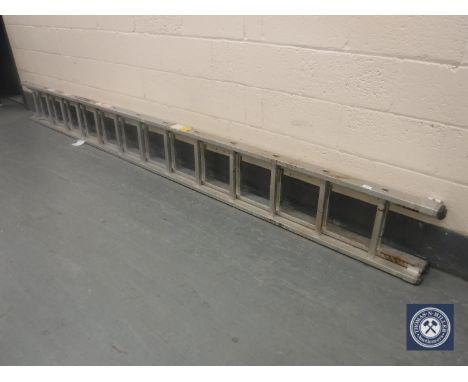 An aluminium double extension ladder (on view in ground floor corridor)