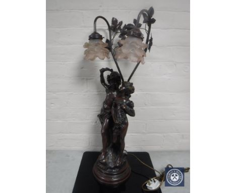 A figural two way table lamp - lovers