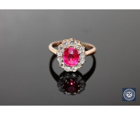 A late Victorian ruby and old-cut diamond cluster ring, size M CONDITION REPORT: Ruby of uncertain origin and is possibly syn