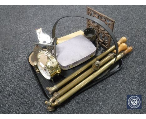 A tray of metal ware including wrought iron sconce, three brass rose sprayers, cast metal wall bracket with bell, cutlery, al