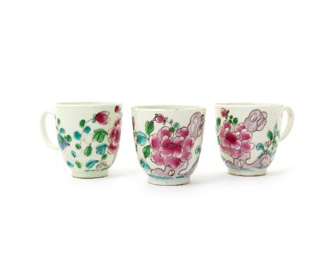 Three Bow coffee cups  c.1752-54, painted in famille rose enamels with large sprays of flowering peony issuing from holey roc