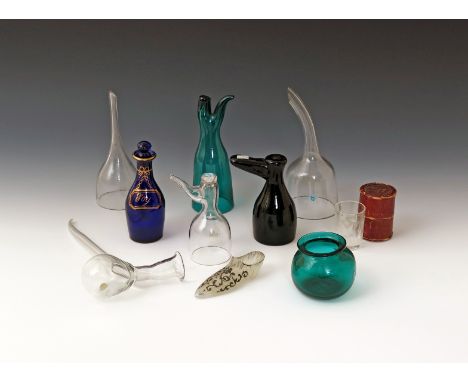 A mixed lot of glass items  18th century and later, including two wine funnels, three stirrup cups in the form of boots, a bl