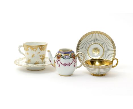 Two Sèvres cups and saucers  18th and 19th centuries, the earlier of gobelet a la Reine shape with a deep trembleuse saucer, 