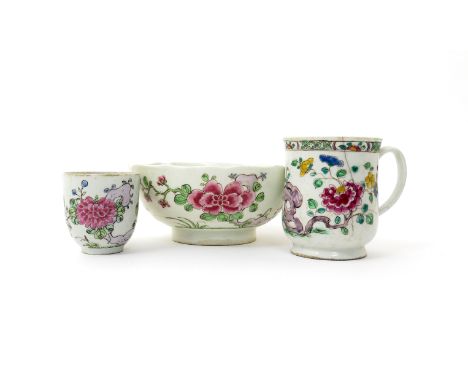 A Bow bell-shaped mug  c.1755, a Bow coffee cup and a Bow bowl with shaped rim, all painted in the famille rose palette with 